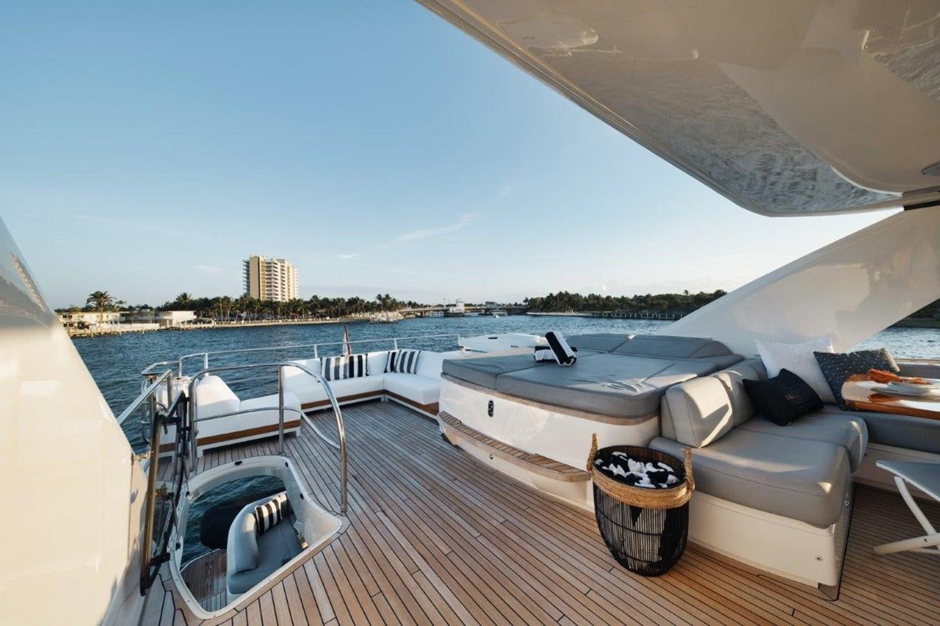 a boat docked at a pier aboard PRONTO Yacht for Sale