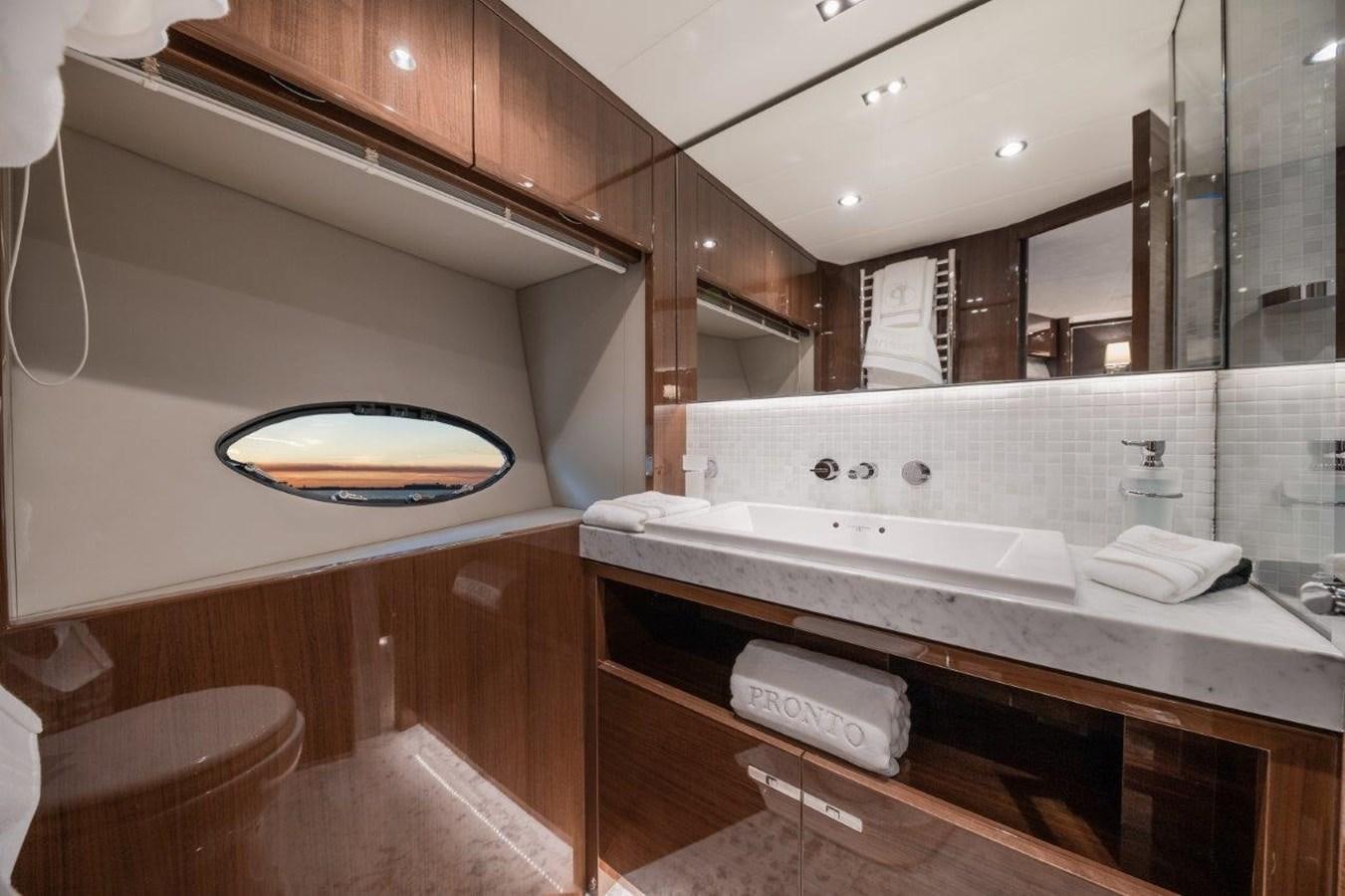 a kitchen with a large sink aboard PRONTO Yacht for Sale
