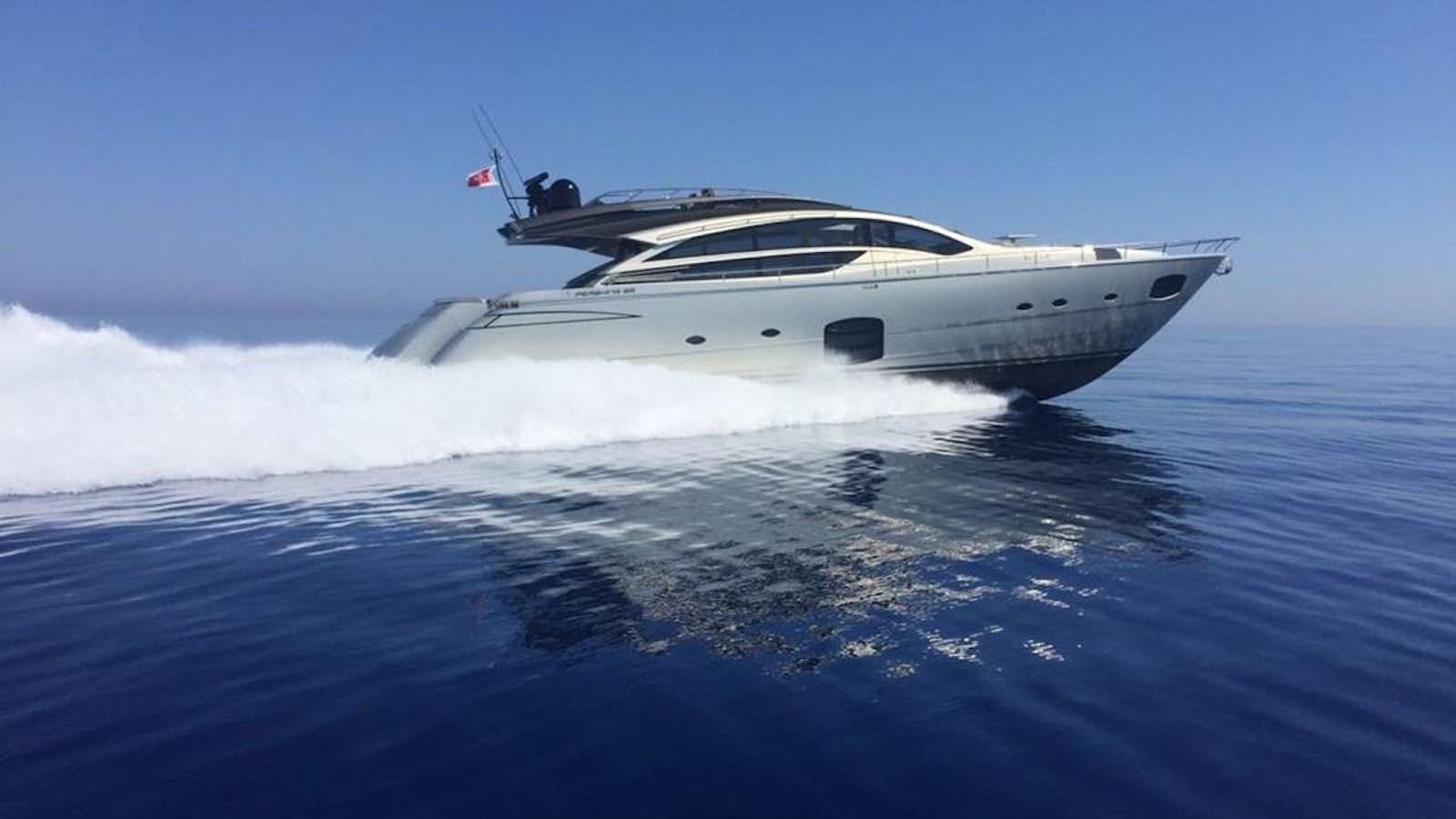 a white yacht in the water aboard 2014 PERSHING 82 Yacht for Sale
