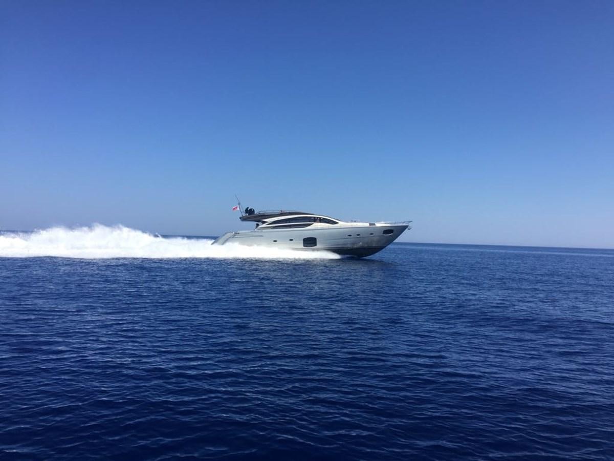 a white boat in the water aboard 2014 PERSHING 82 Yacht for Sale