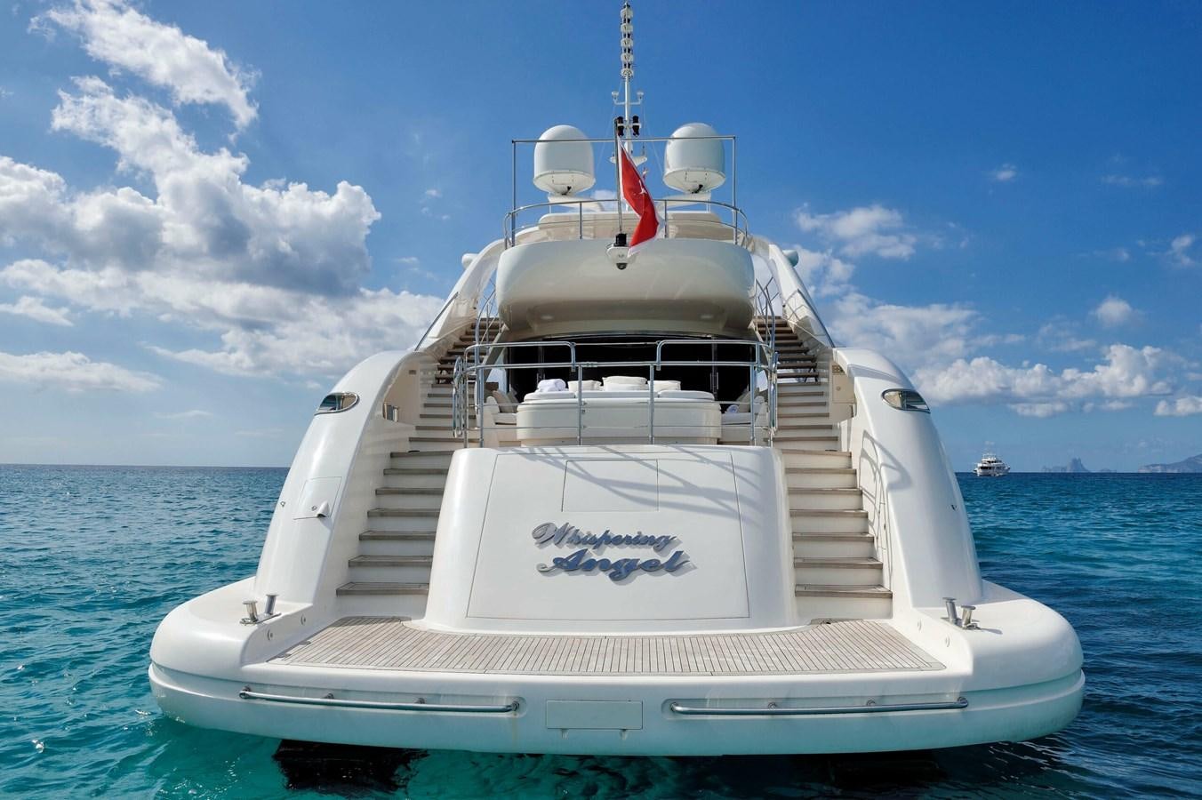a white boat in the water aboard WHISPERING ANGEL Yacht for Sale