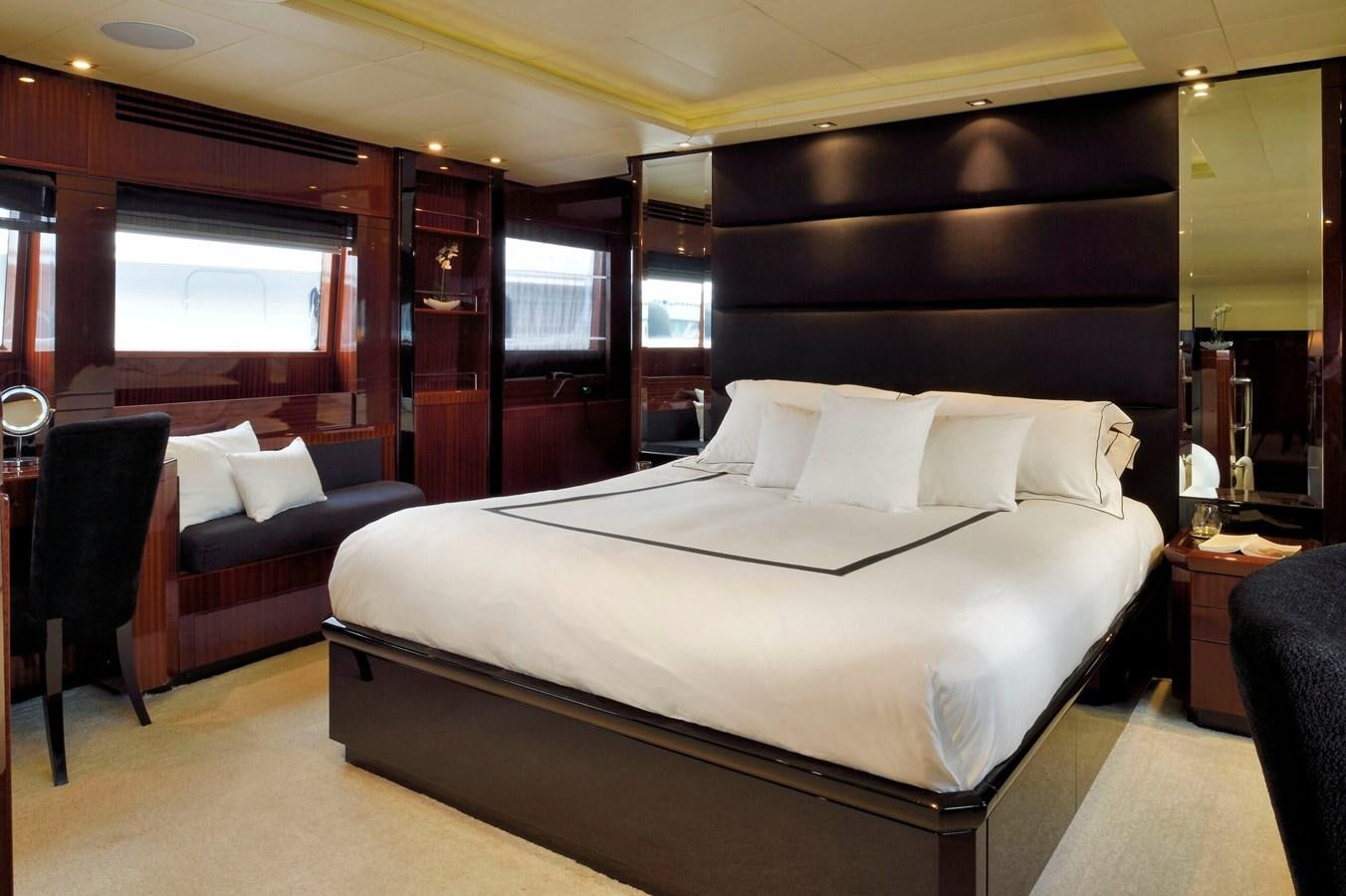 a bed in a room aboard WHISPERING ANGEL Yacht for Sale