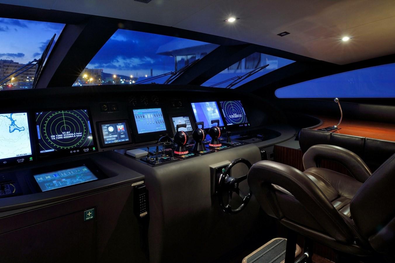 a control room with many monitors aboard WHISPERING ANGEL Yacht for Sale