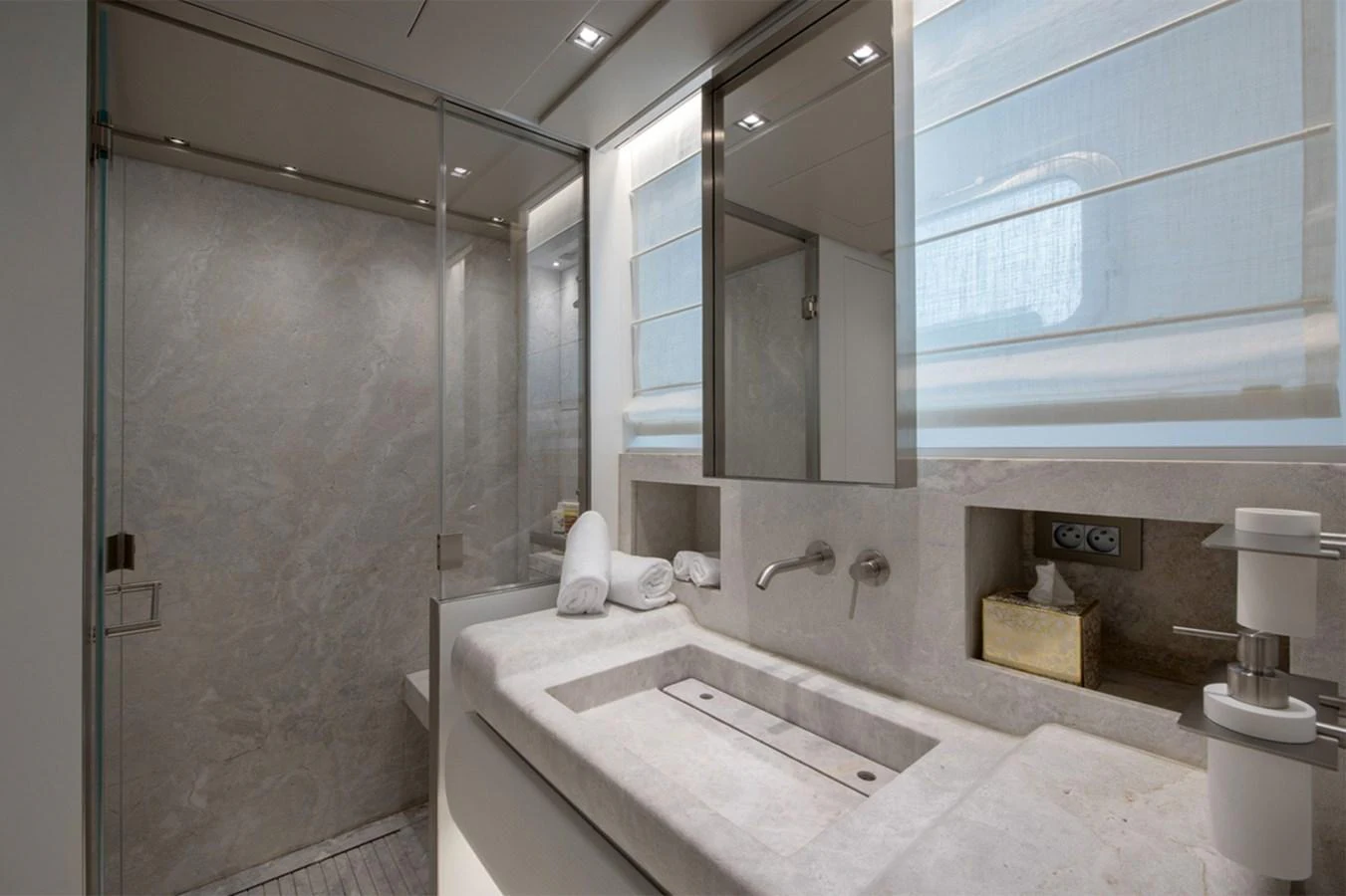 a bathroom with a large mirror aboard 2016 SANLORENZO SL106 #625 Yacht for Sale