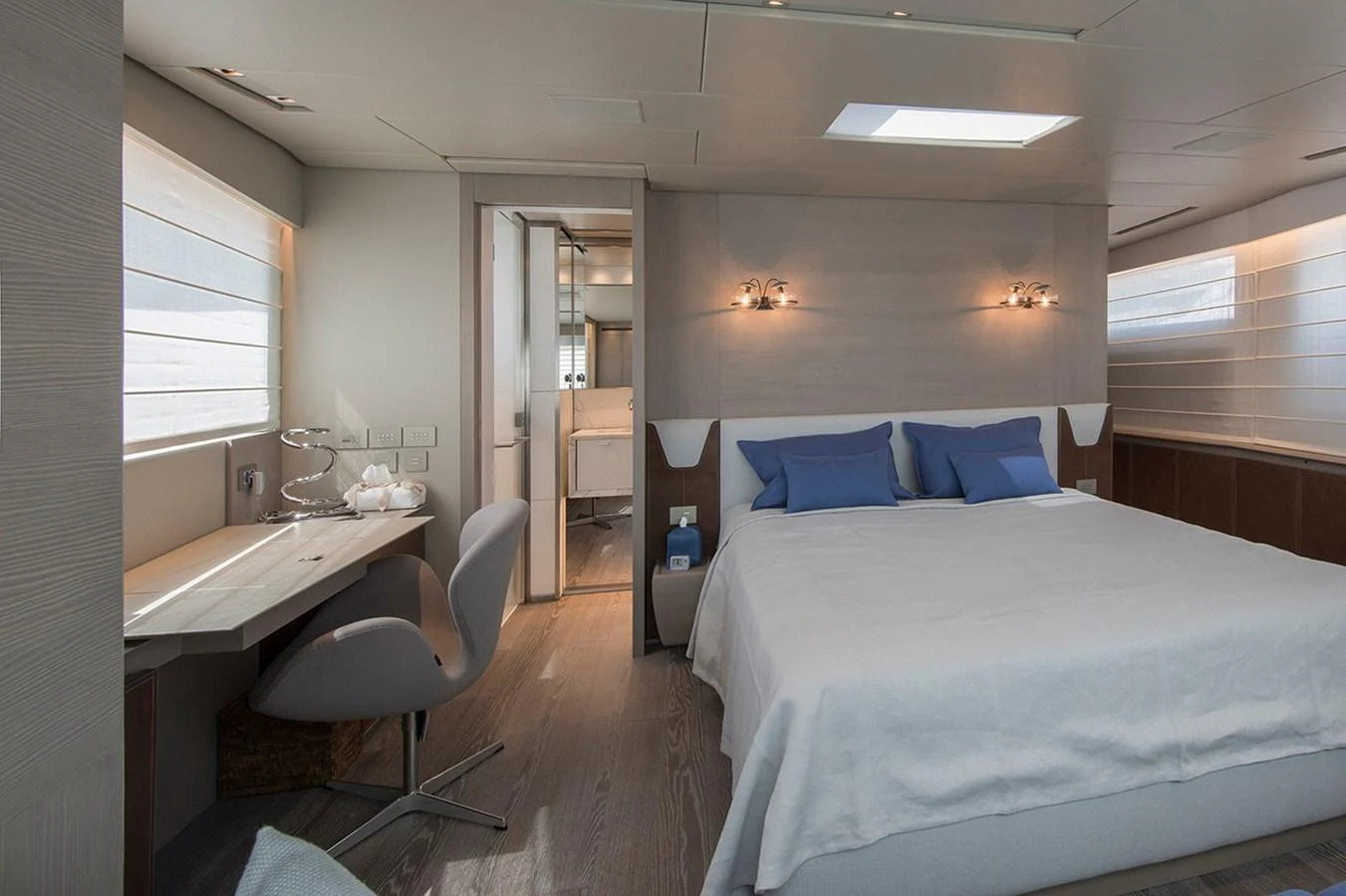 a bedroom with a bed and a sink aboard 2016 SANLORENZO SL106 #625 Yacht for Sale