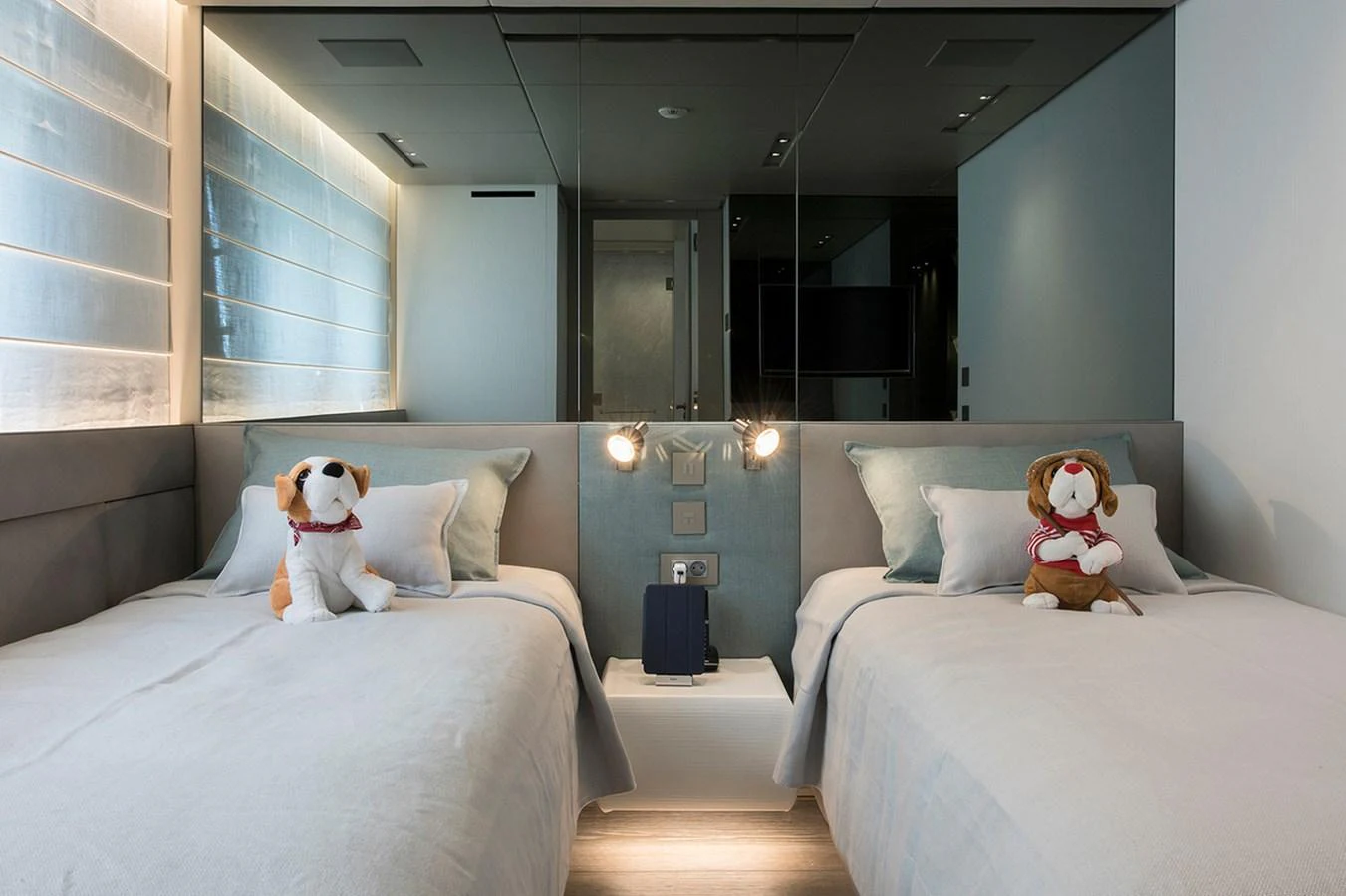 a room with a couple of beds and a plush toy aboard 2016 SANLORENZO SL106 #625 Yacht for Sale