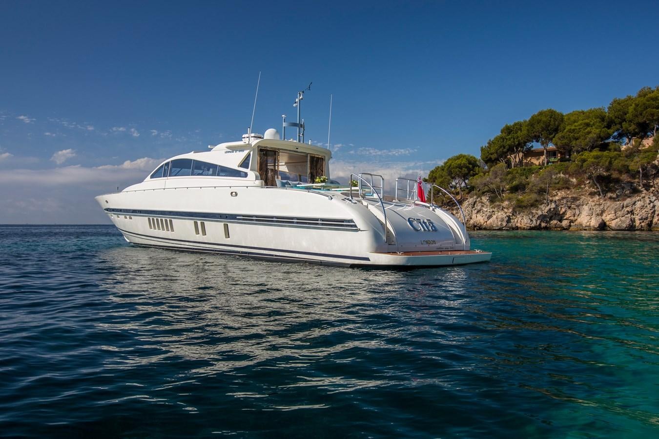 a white boat in the water aboard CITA Yacht for Sale