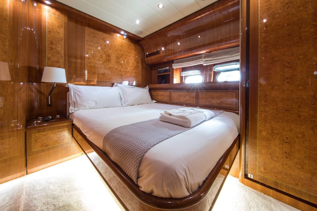 a bed in a room aboard CITA Yacht for Sale