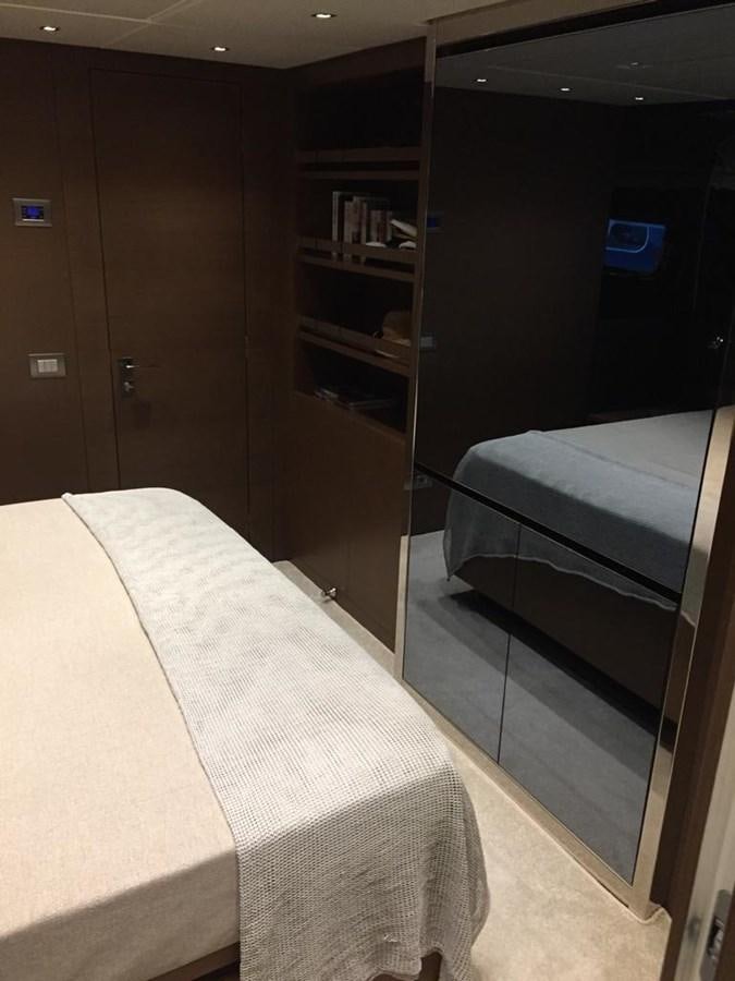 a bed in a room aboard TAIJI Yacht for Sale
