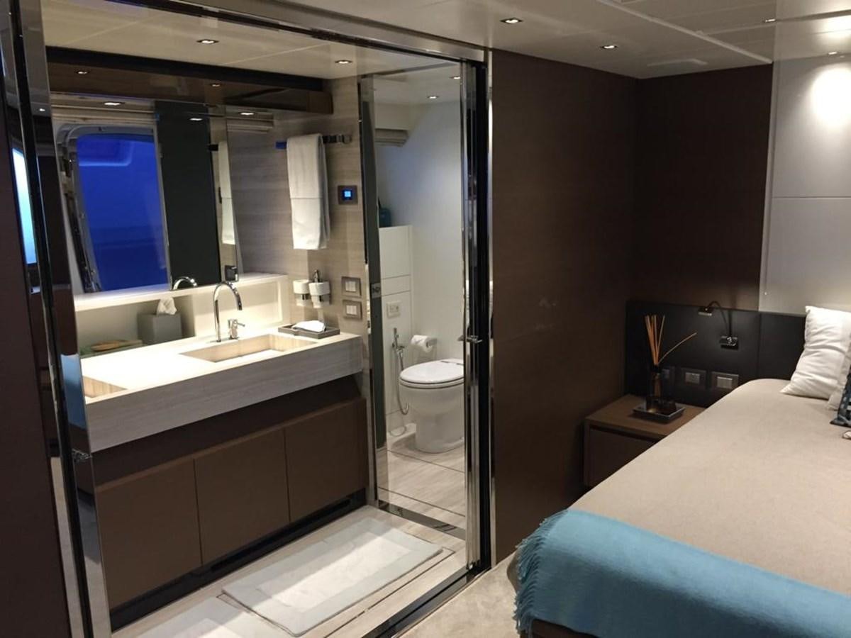 a bathroom with a large mirror aboard TAIJI Yacht for Sale