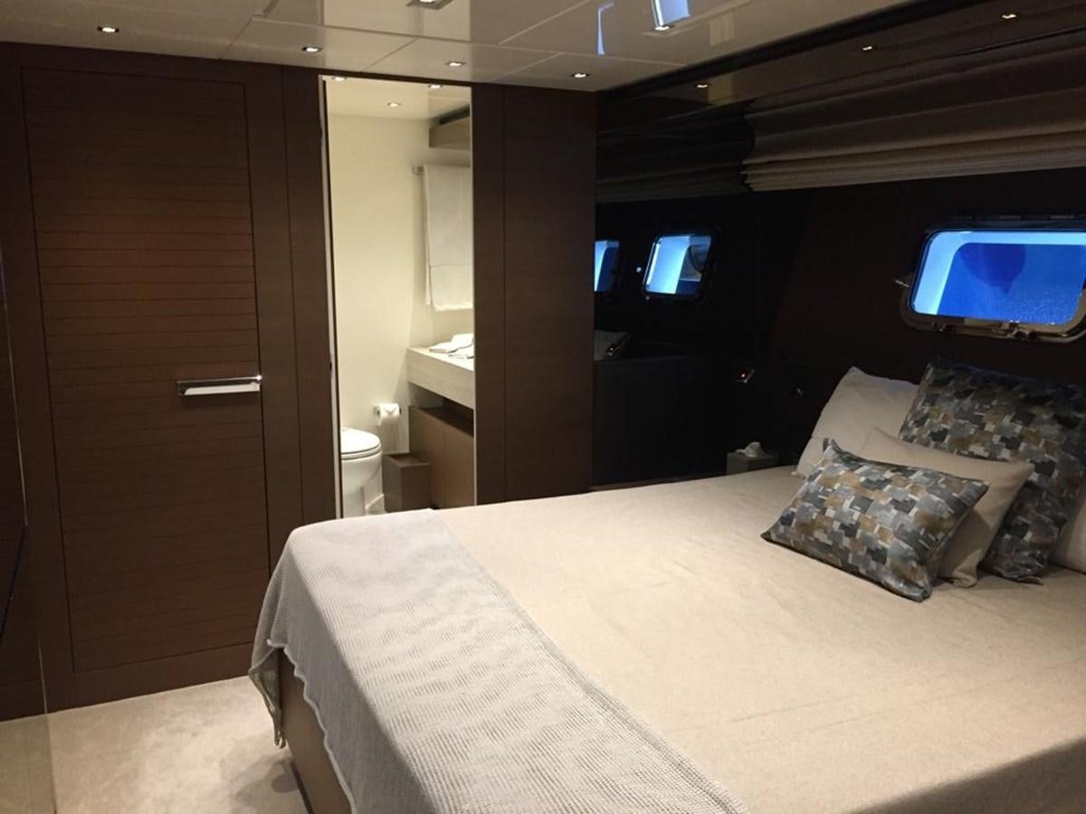 a hotel room with a bed aboard TAIJI Yacht for Sale