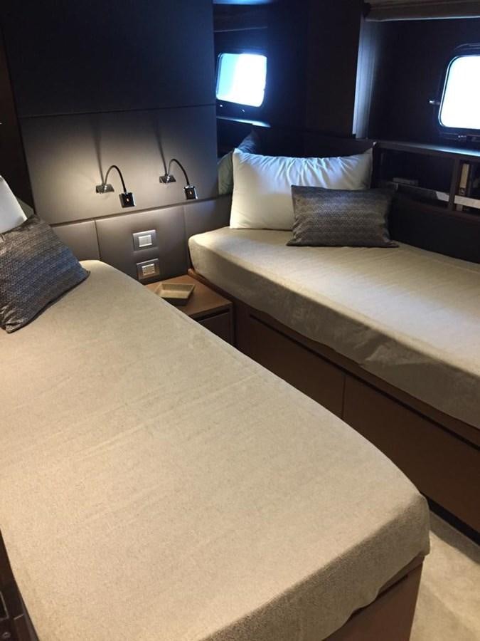a couple of beds in a room aboard TAIJI Yacht for Sale