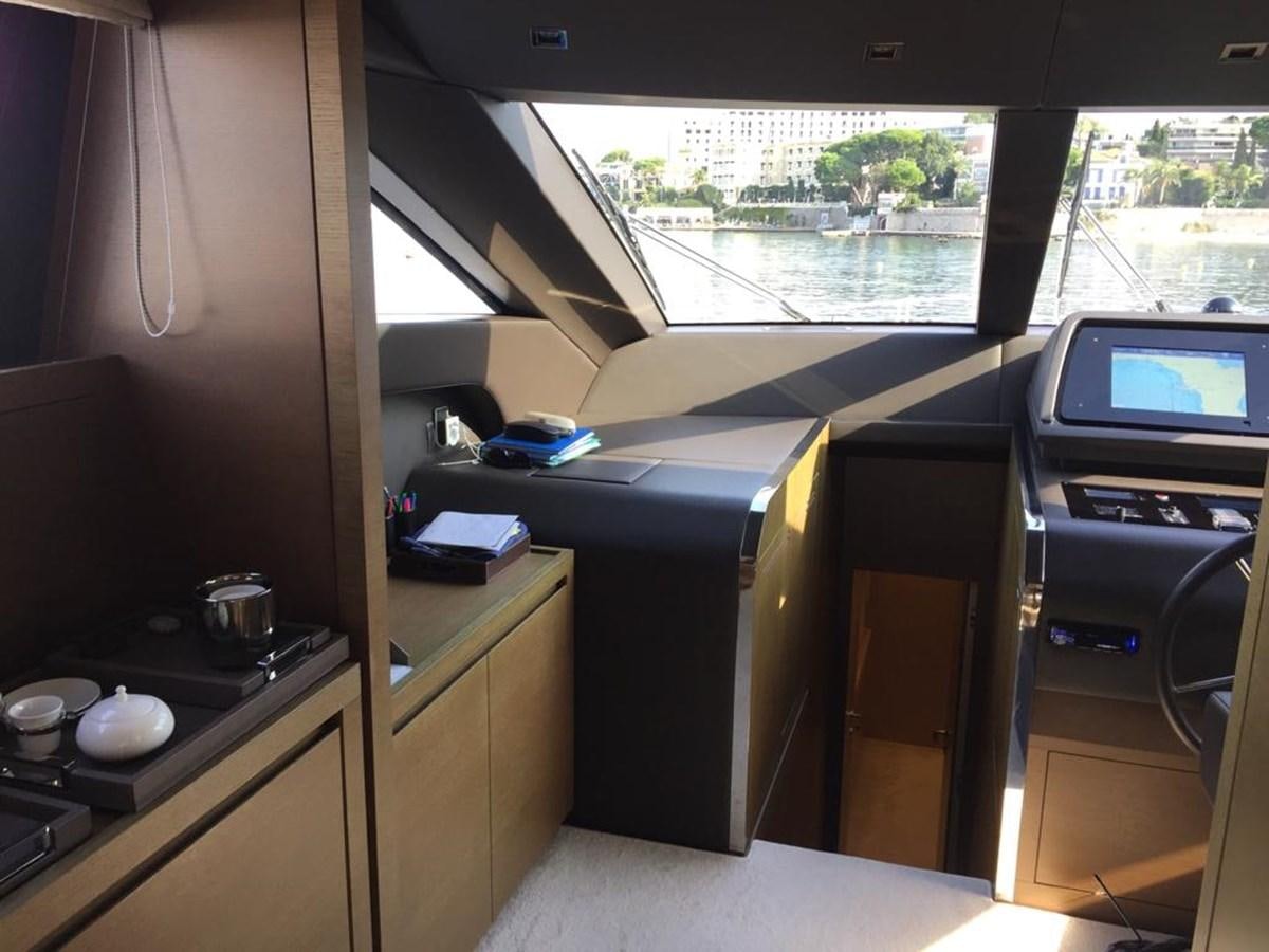a kitchen with a window aboard TAIJI Yacht for Sale