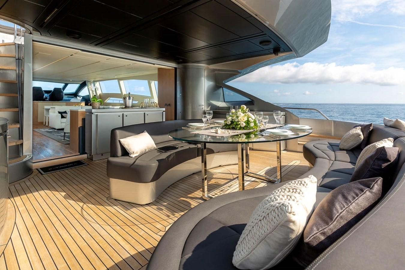 a living room with a large open window aboard X-TREM II Yacht for Sale