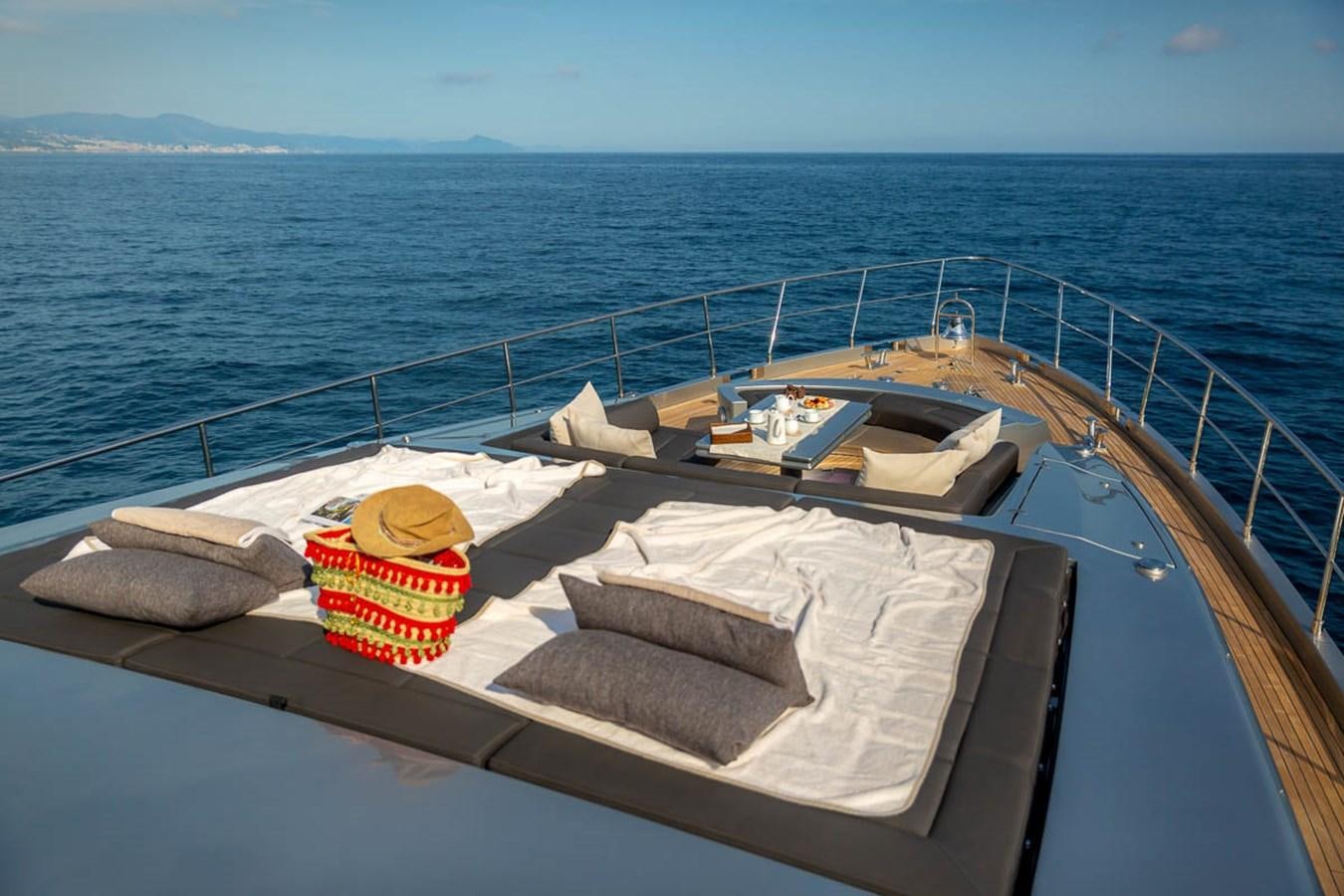 a boat with towels and pillows on it aboard X-TREM II Yacht for Sale