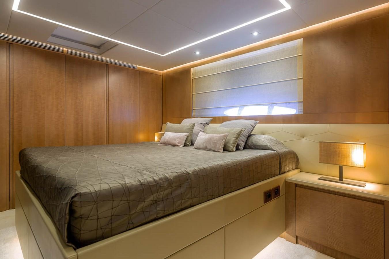 a bed in a room aboard X-TREM II Yacht for Sale