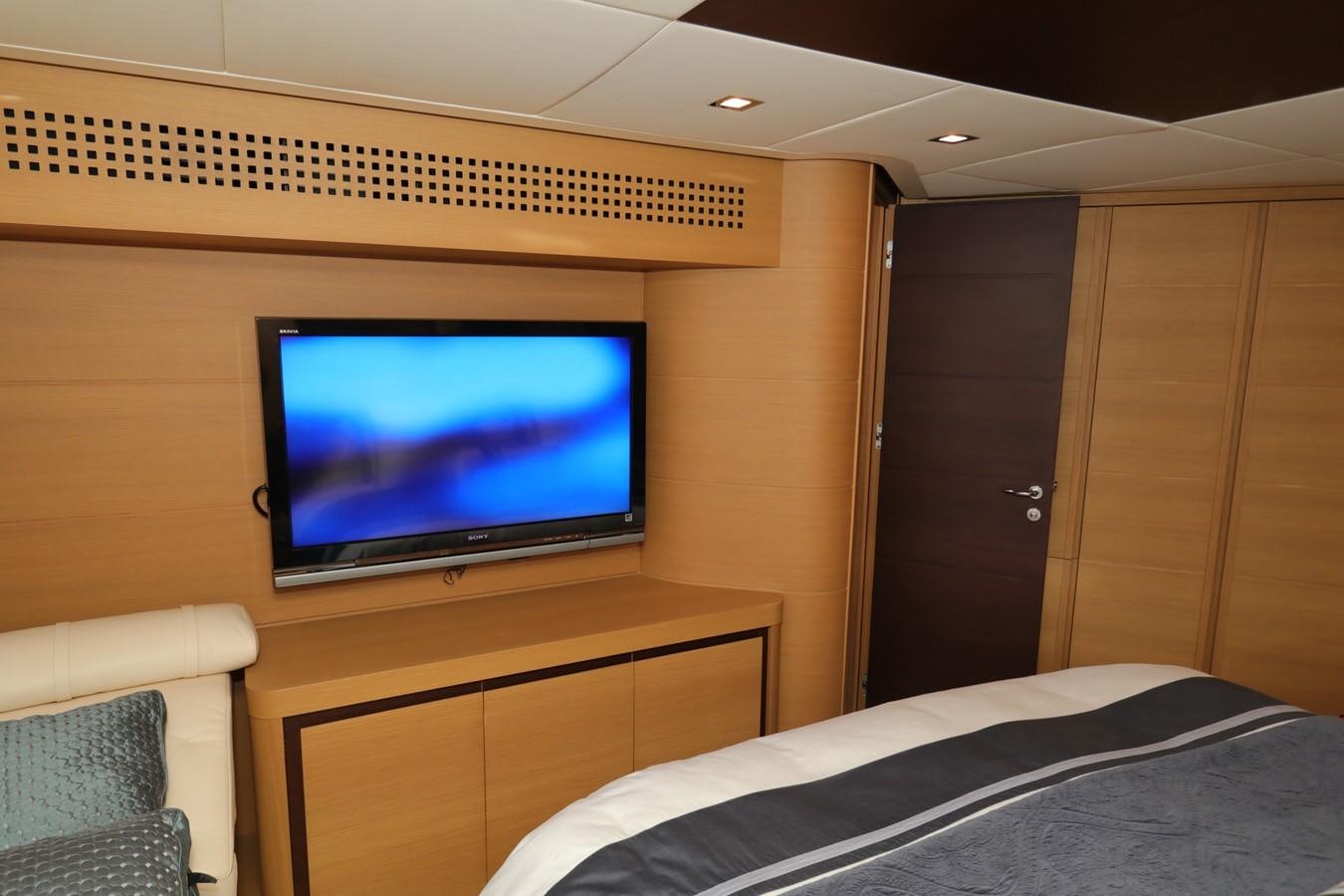 a tv on a stand aboard VANTAGE Yacht for Sale
