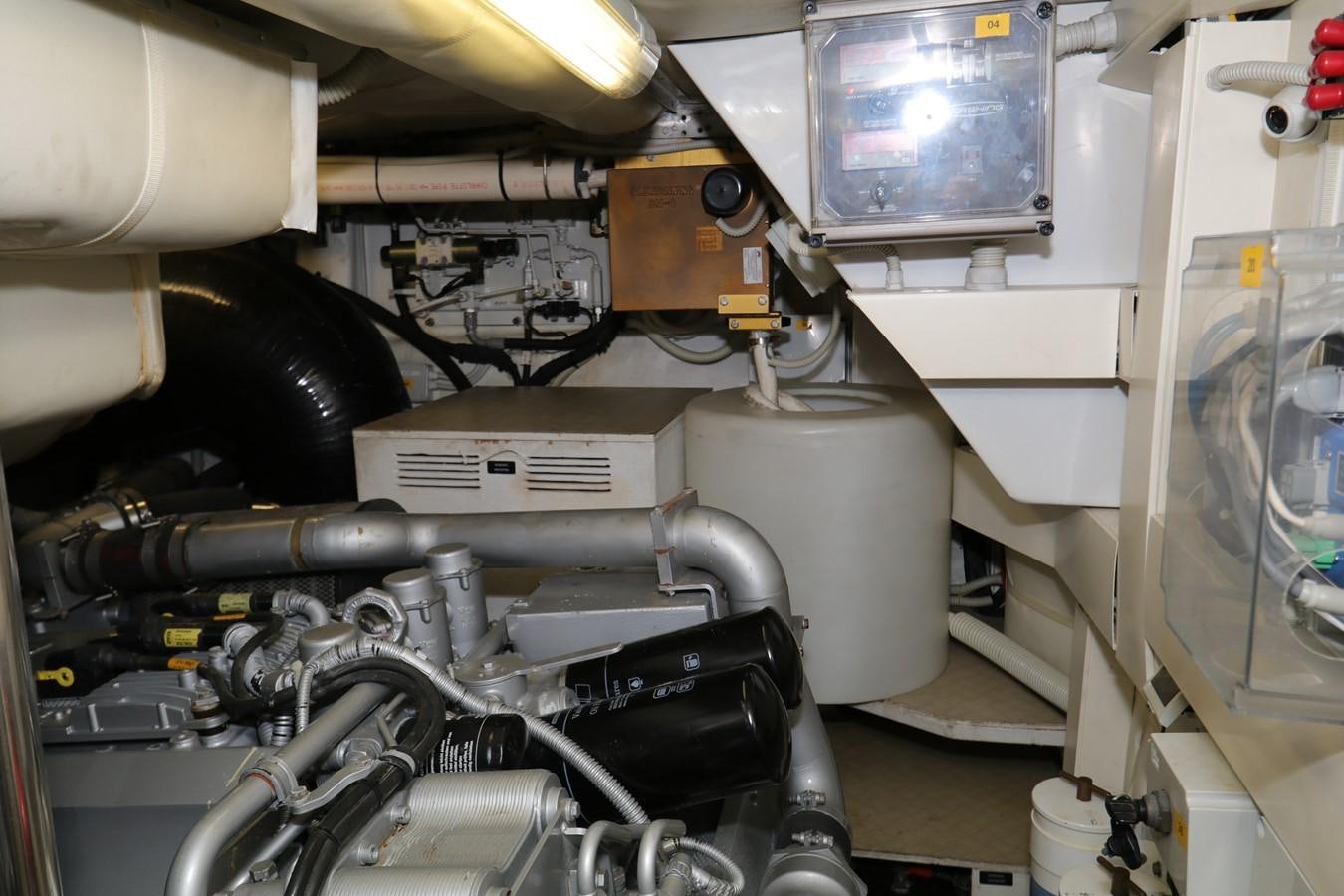 a machine with a large piece of equipment in it aboard VANTAGE Yacht for Sale