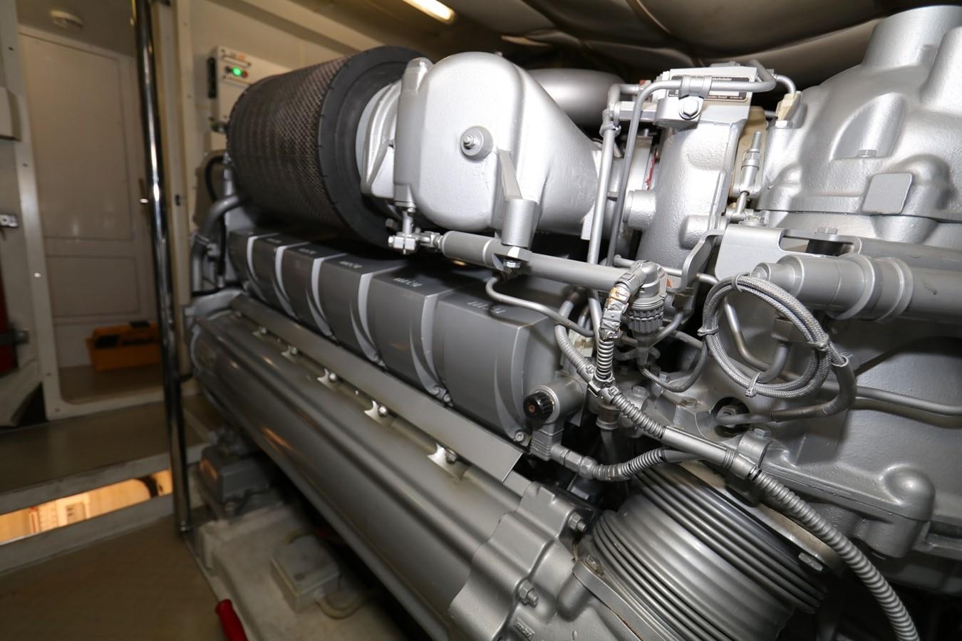 a car engine with a hood aboard VANTAGE Yacht for Sale