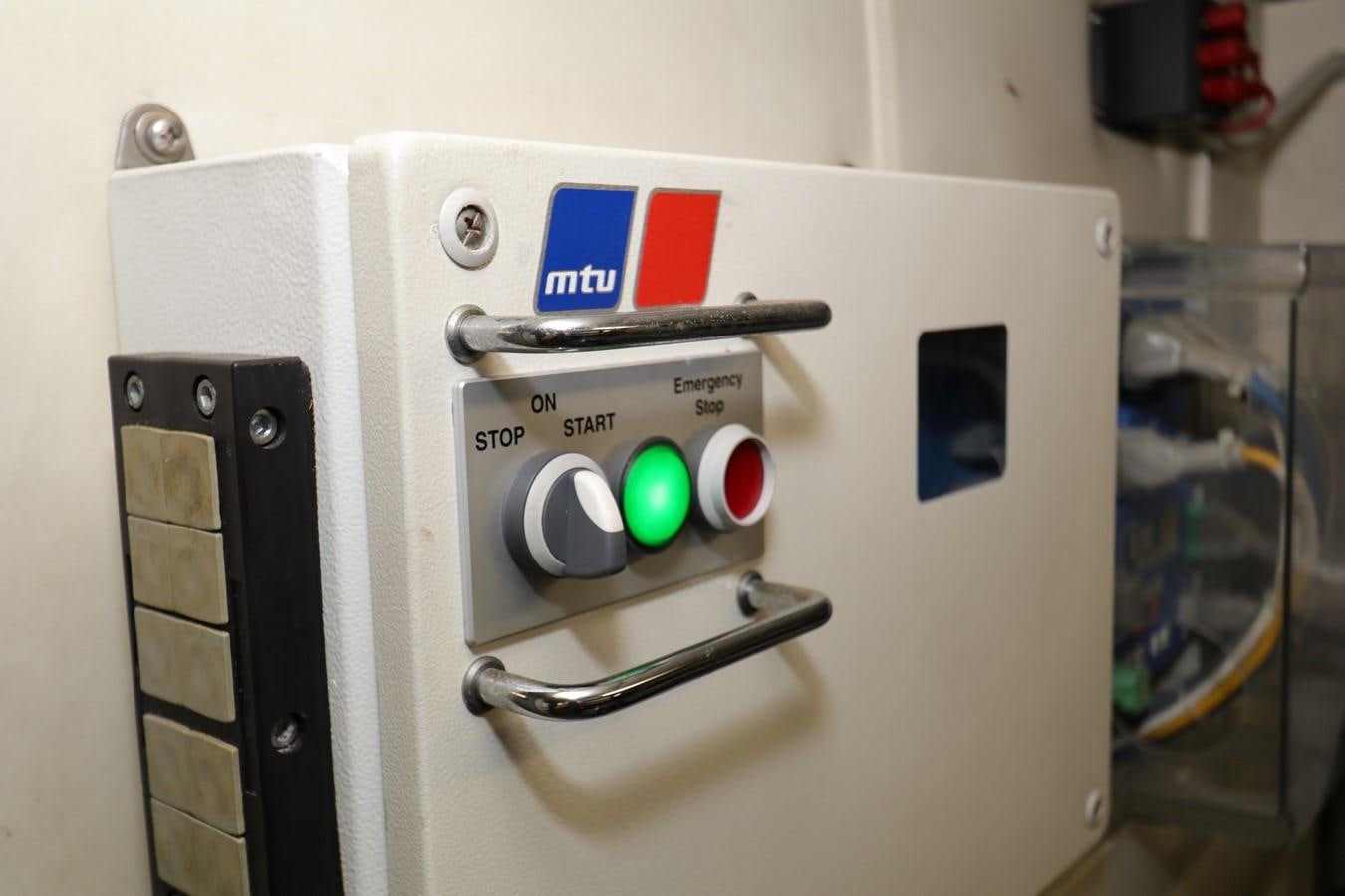 a machine with buttons and a screen aboard VANTAGE Yacht for Sale