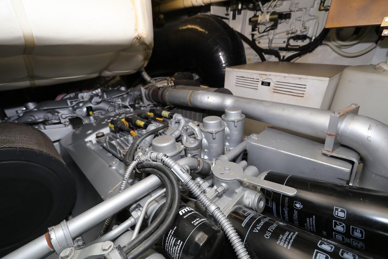 a car engine with a few parts aboard VANTAGE Yacht for Sale