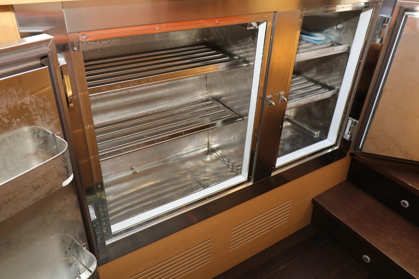 a large oven with glass doors aboard VANTAGE Yacht for Sale