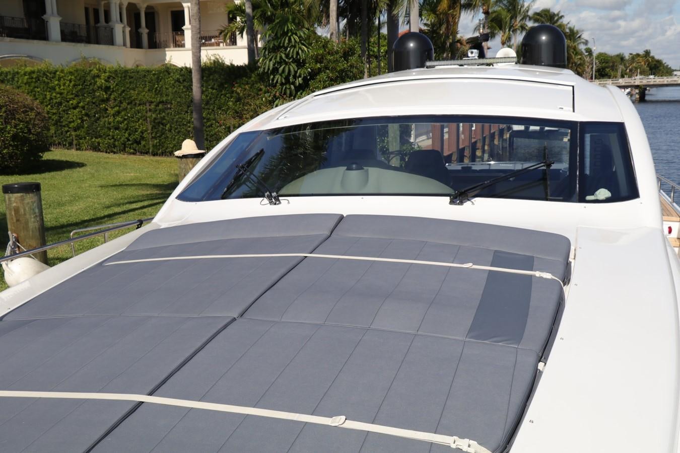 a white car parked on a driveway aboard VANTAGE Yacht for Sale