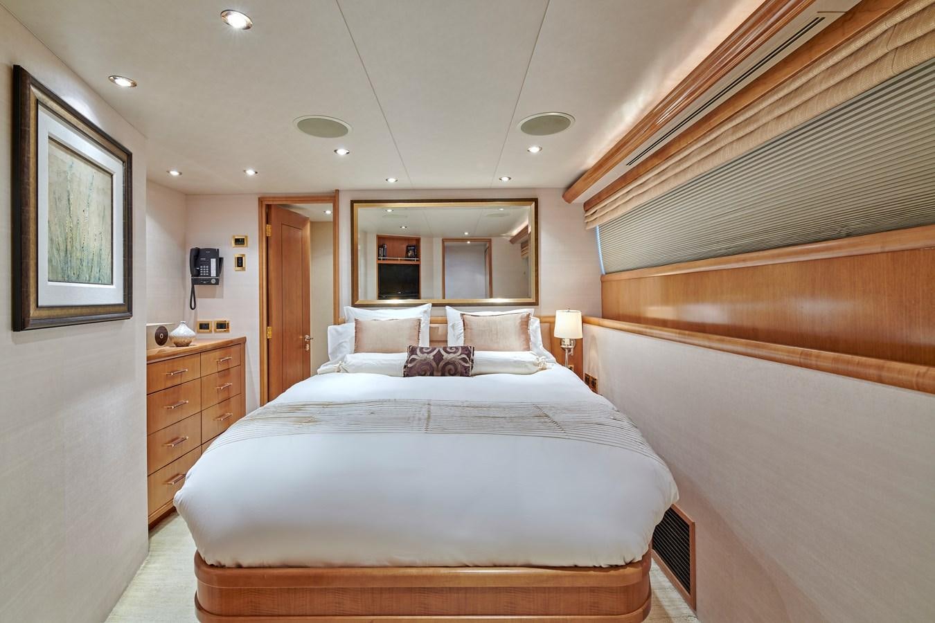 a bedroom with a bed aboard HATATY Yacht for Sale