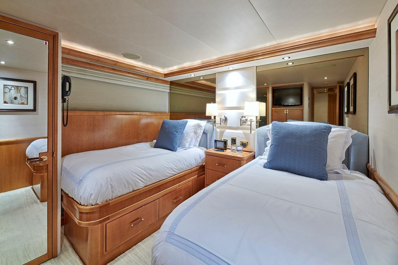 a couple of beds in a hotel room aboard HATATY Yacht for Sale
