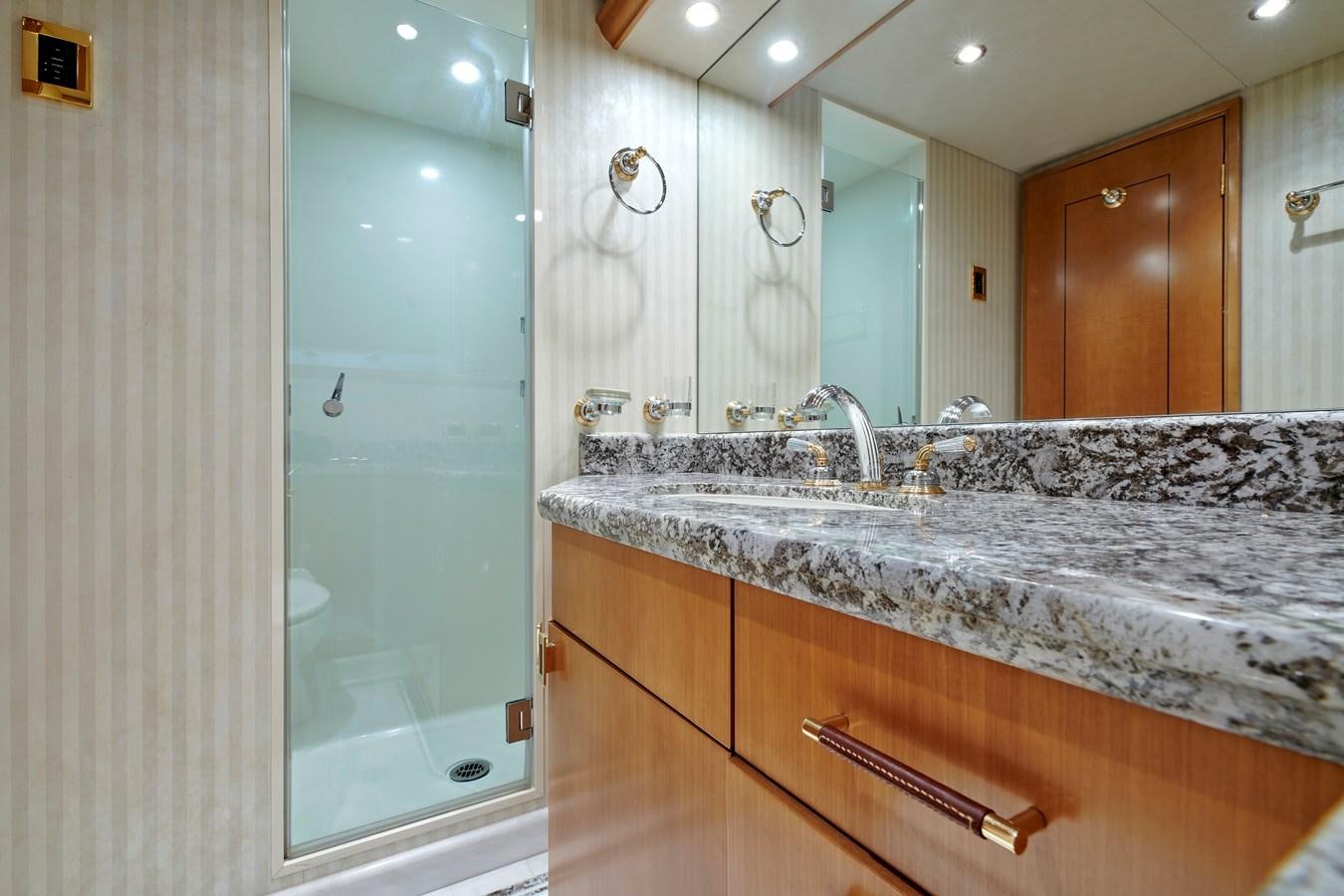 a bathroom with a marble counter top aboard HATATY Yacht for Sale