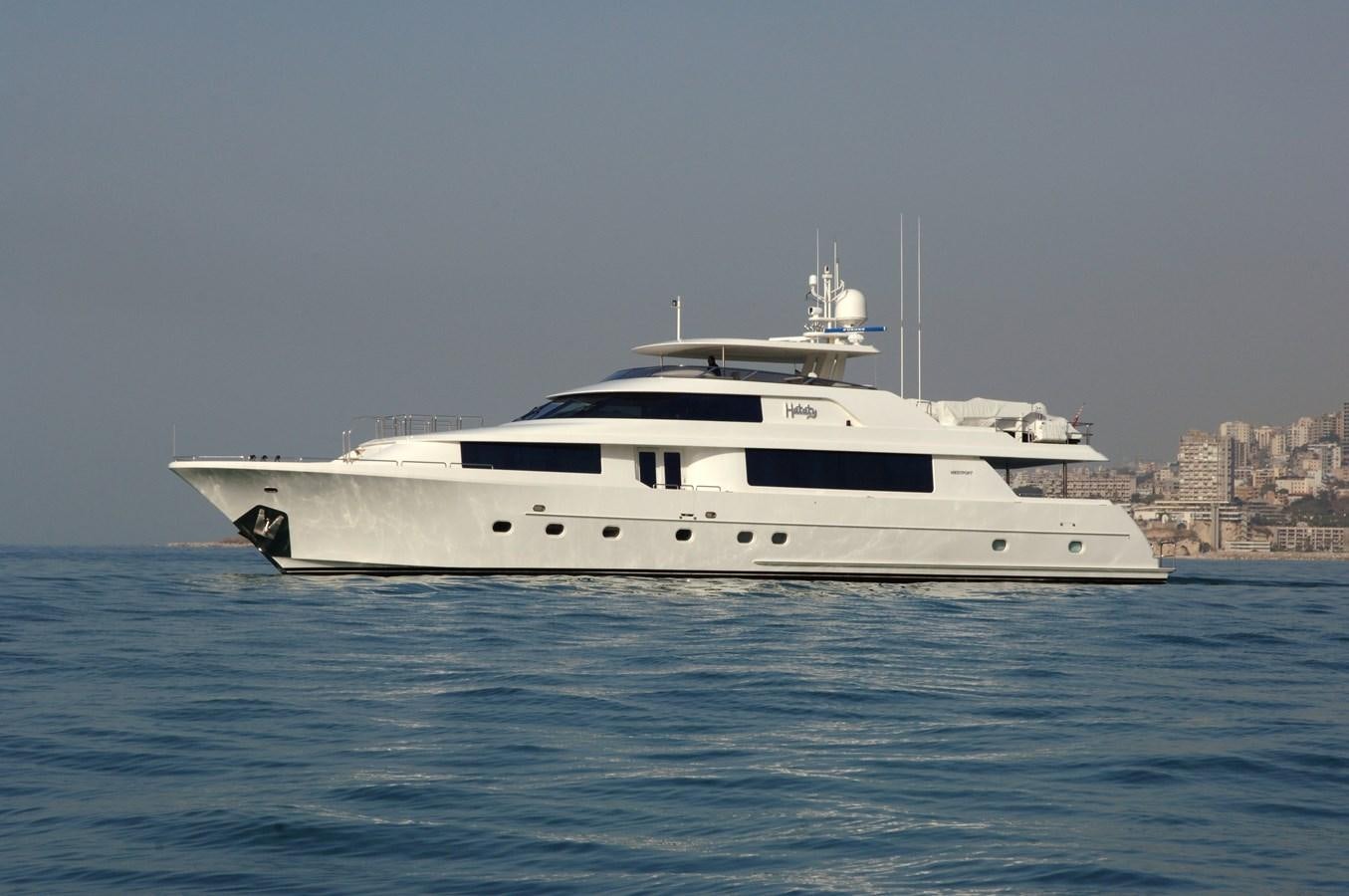 a white yacht in the water aboard HATATY Yacht for Sale