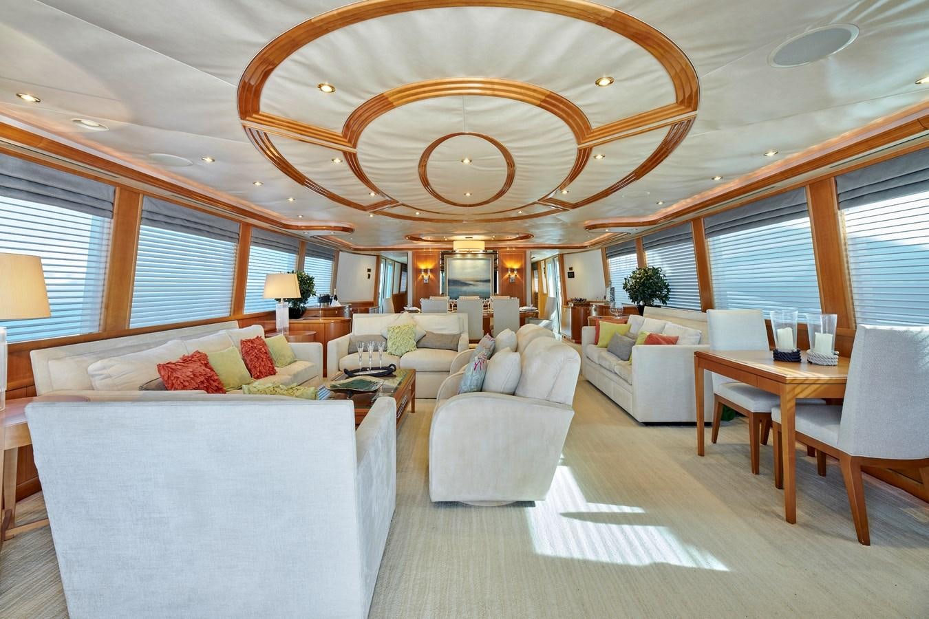 a large living room with a large chandelier aboard HATATY Yacht for Sale