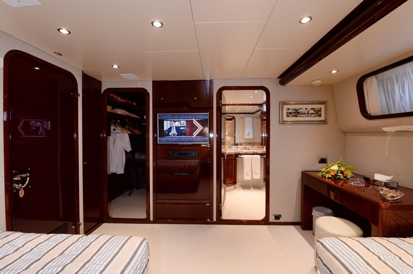 a room with a bed and a desk aboard SHAF Yacht for Sale