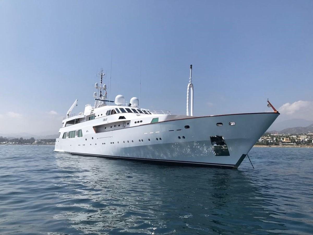 a white boat in the water aboard SHAF Yacht for Sale