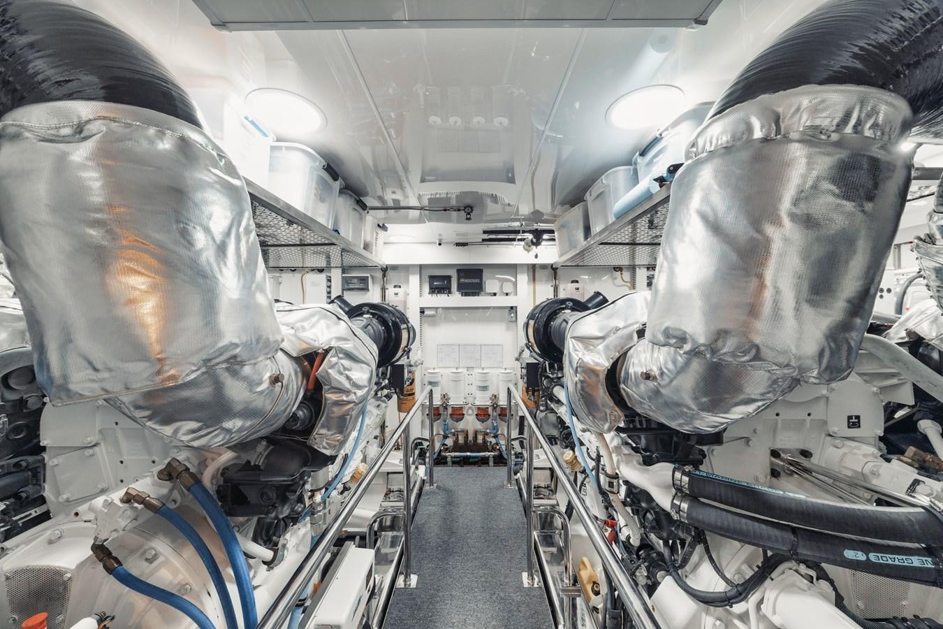 a room full of robots aboard 2019 OCEAN ALEXANDER 88 SKYLOUNGE MUDSLINGER Yacht for Sale