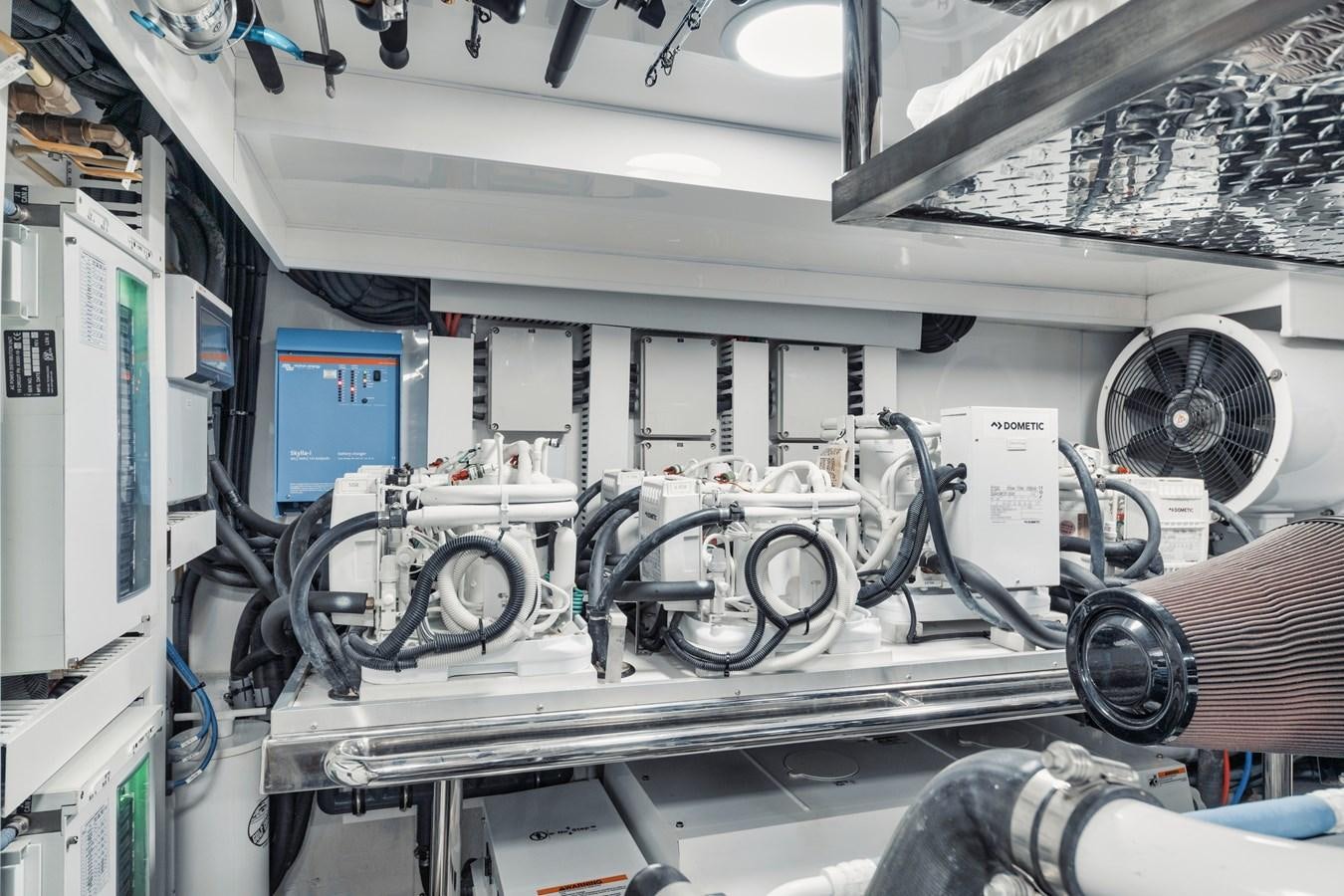 a room with machinery and equipment aboard 2019 OCEAN ALEXANDER 88 SKYLOUNGE MUDSLINGER Yacht for Sale