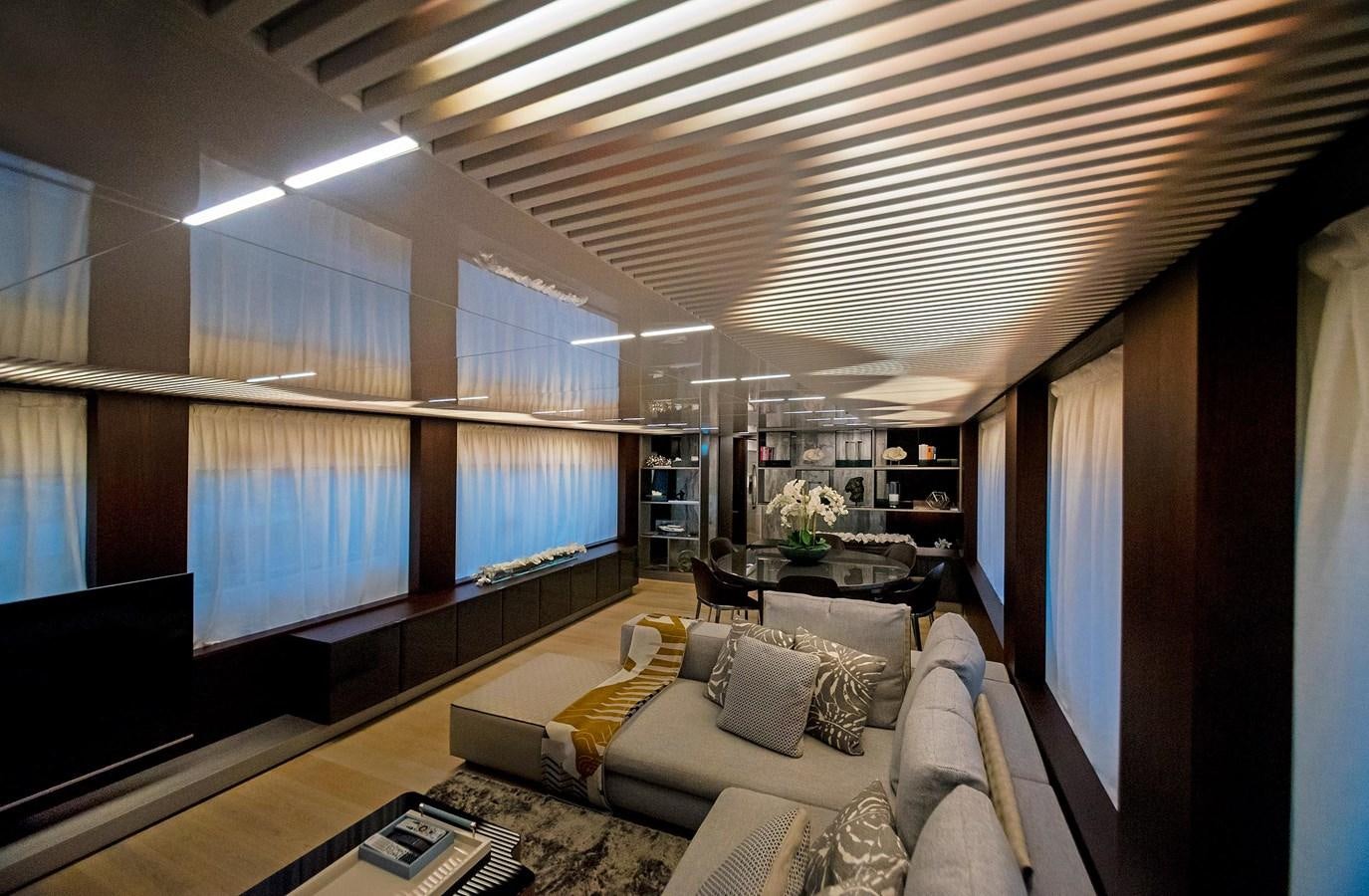 a living room with a large window aboard LA MARTINA Yacht for Sale