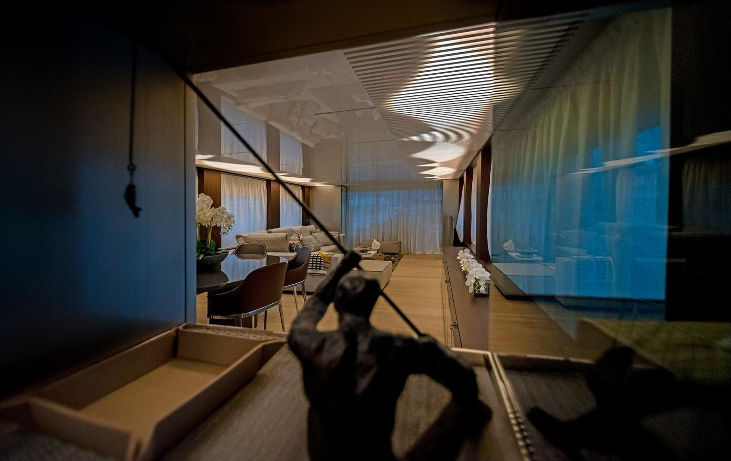 a dog sitting on a couch aboard LA MARTINA Yacht for Sale