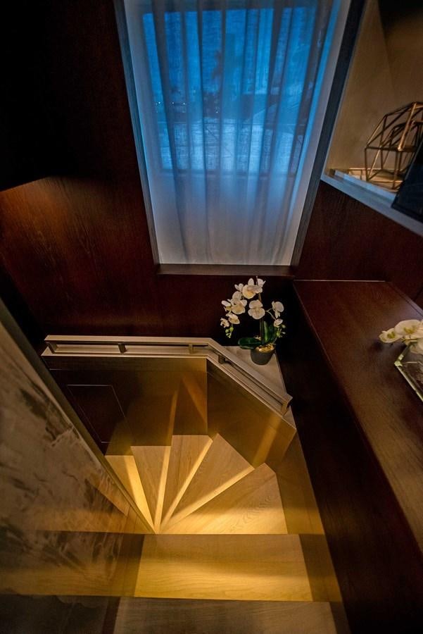 a window with a curtain aboard LA MARTINA Yacht for Sale