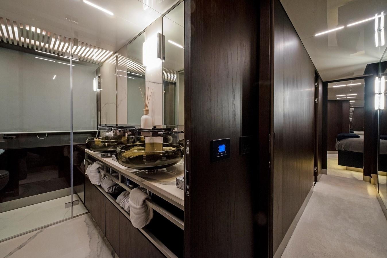 a bathroom with a sink and a mirror aboard LA MARTINA Yacht for Sale