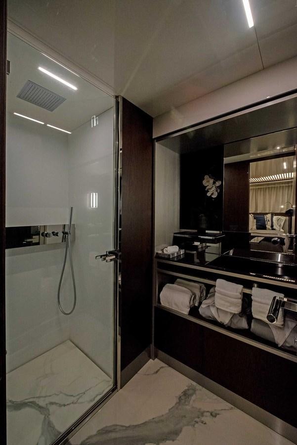 a bathroom with a large mirror aboard LA MARTINA Yacht for Sale