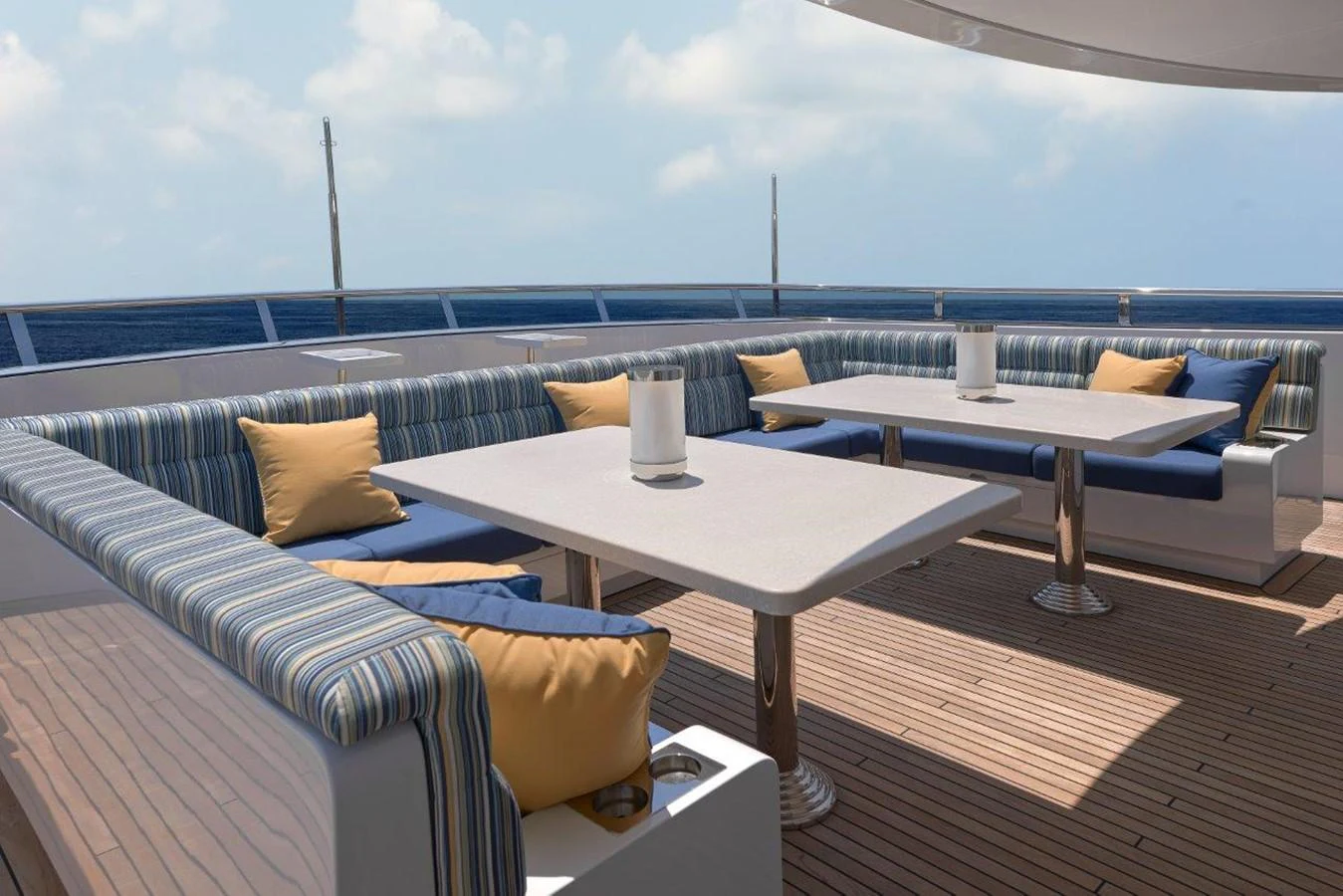a room with a table and chairs aboard EP150 Yacht for Sale