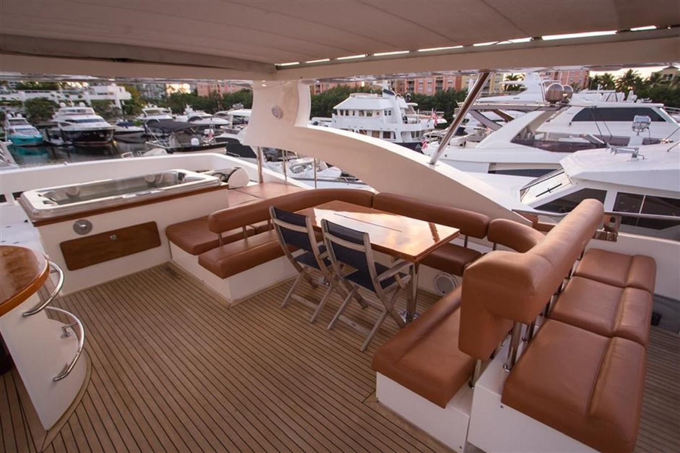 a room with many seats and tables aboard BLUOCEAN Yacht for Sale