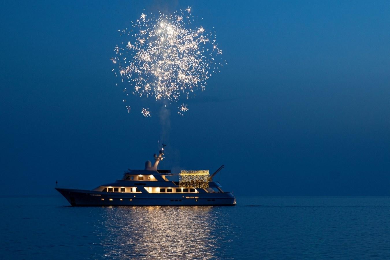 a boat in the water with a cloud of white smoke in the sky aboard MONACO Yacht for Sale
