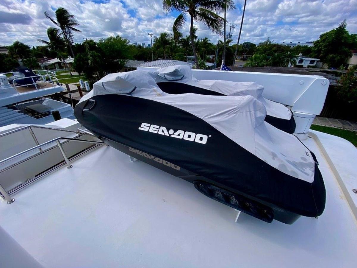 a row of boats on a beach aboard BRANDI WINE Yacht for Sale