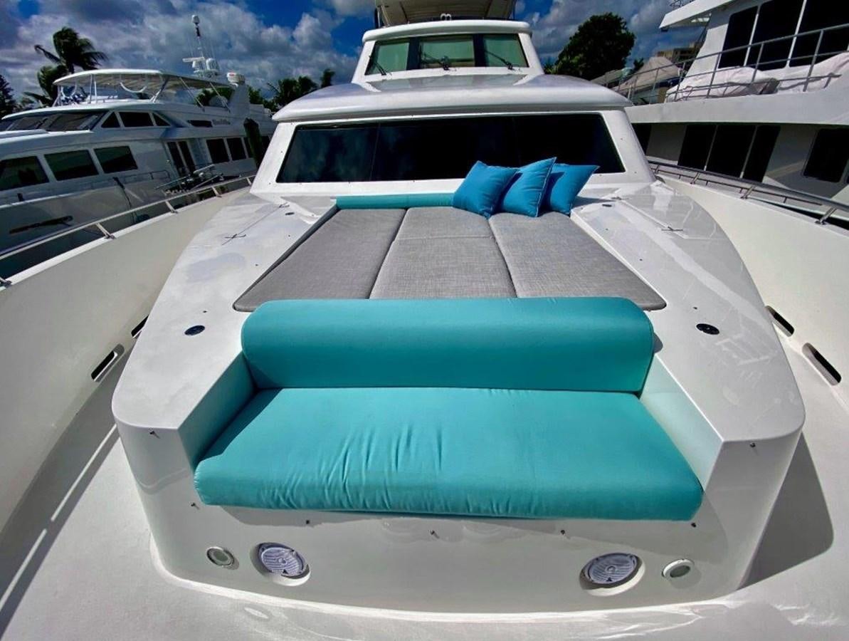a white car with a green seat aboard BRANDI WINE Yacht for Sale