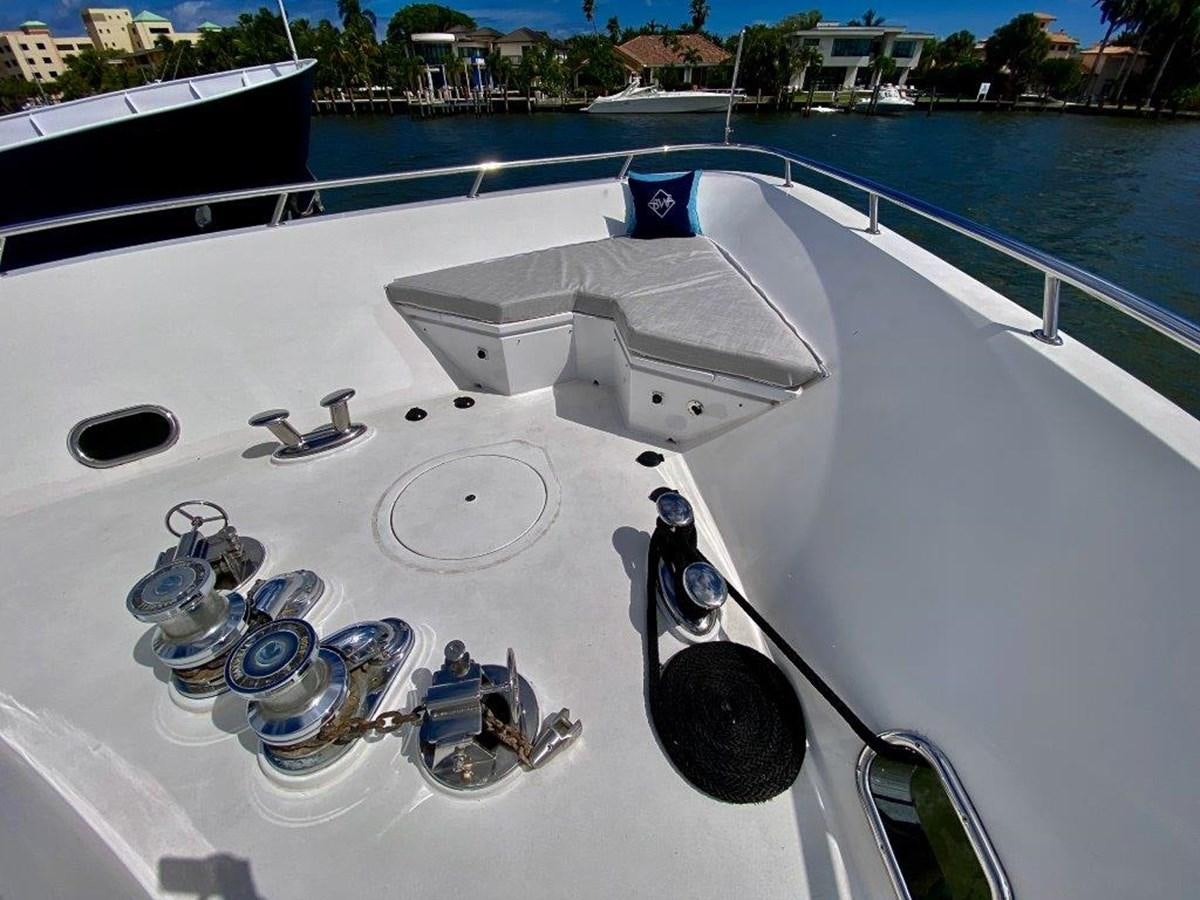 a white boat with a person on it aboard BRANDI WINE Yacht for Sale