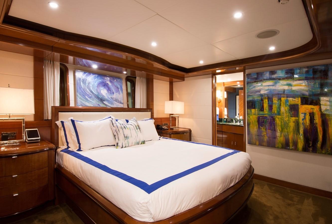 a bedroom with a large bed aboard HORIZONS II Yacht for Sale