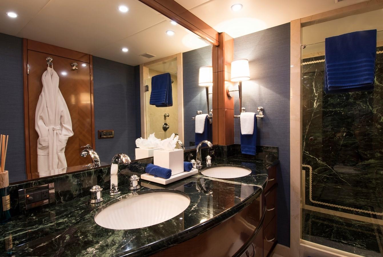 a bathroom with a large mirror aboard HORIZONS II Yacht for Sale