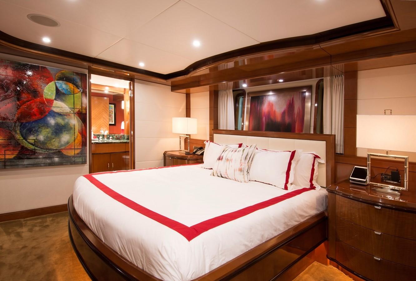 a large bedroom with a large bed aboard HORIZONS II Yacht for Sale